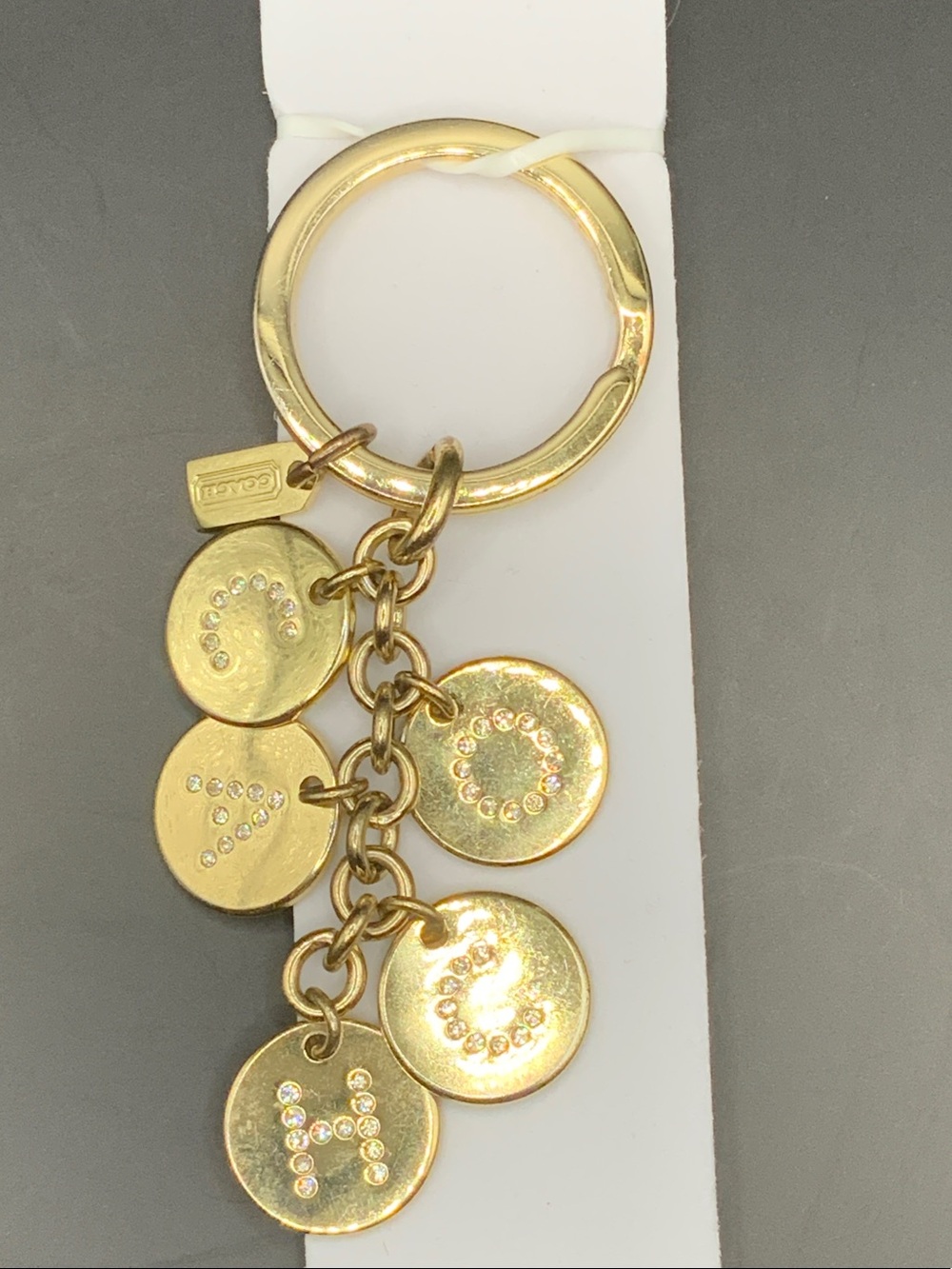 Coach Gold-Tone Crystal Initial Disc Keychain